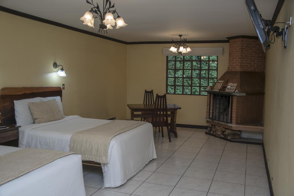 Hotel Chalet Tirol Heredia Quarto foto