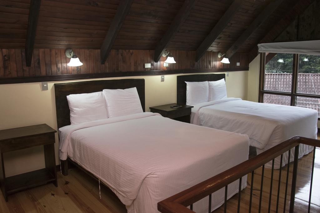 Hotel Chalet Tirol Heredia Quarto foto