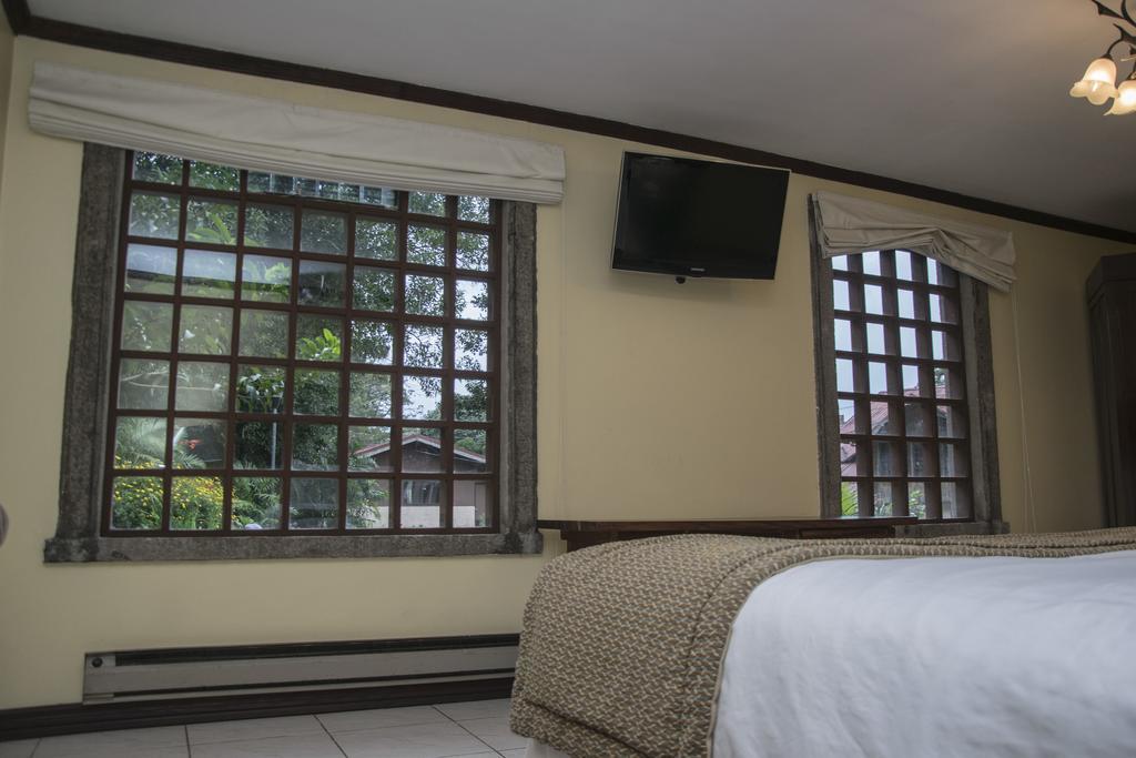Hotel Chalet Tirol Heredia Quarto foto