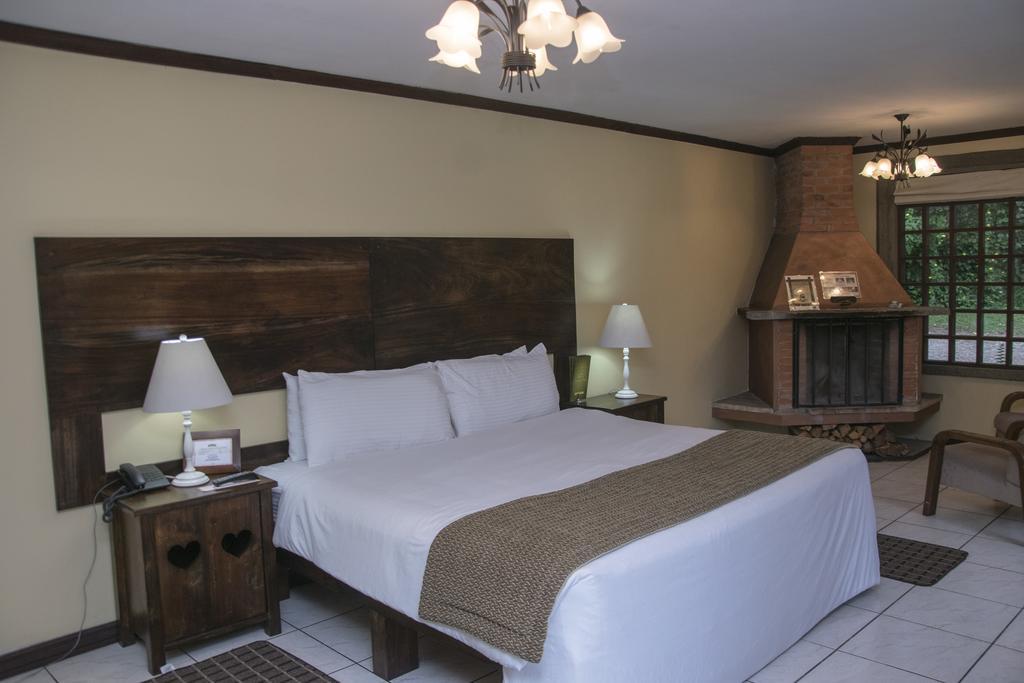 Hotel Chalet Tirol Heredia Quarto foto